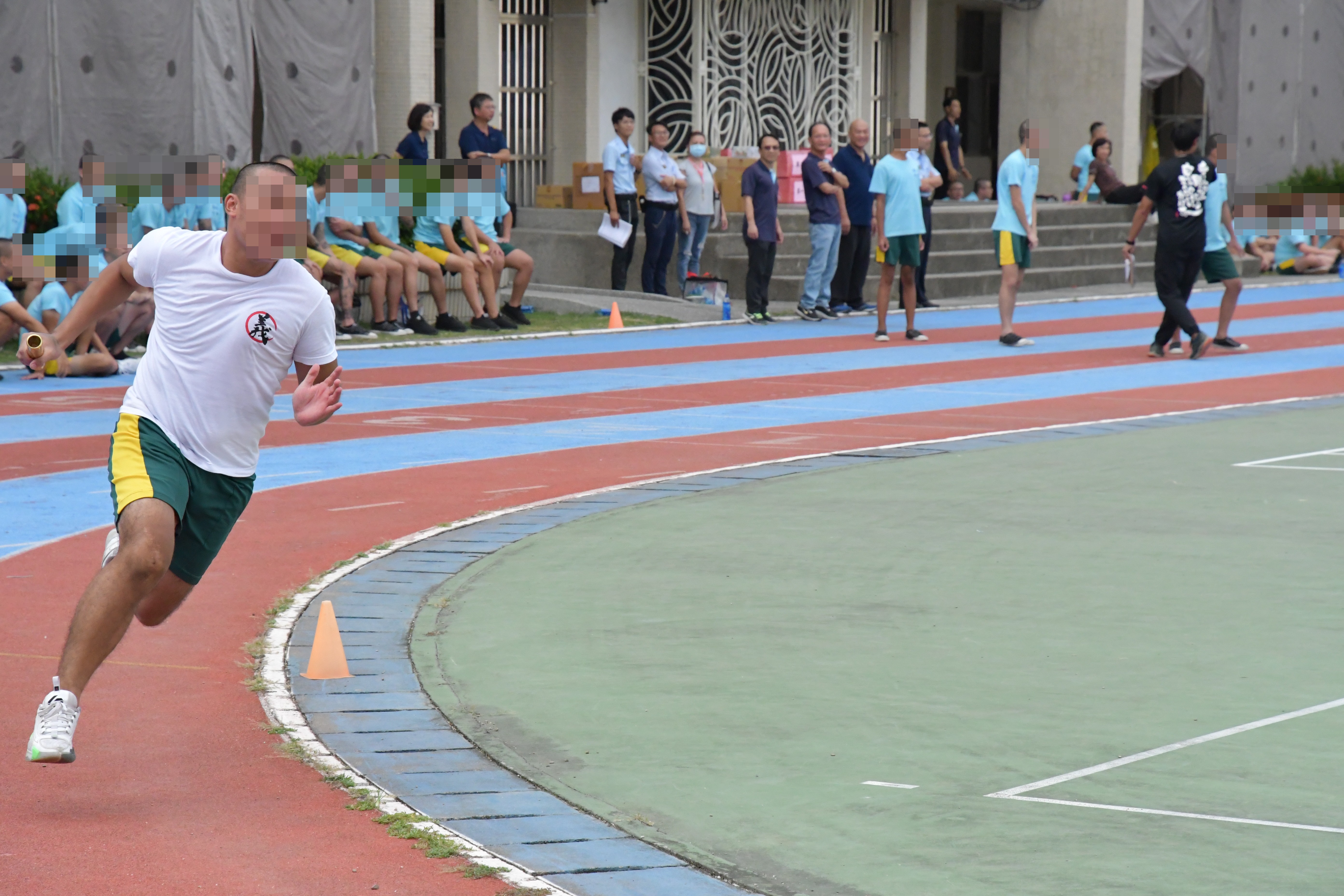 The sound of cheering can be heard outside the stadium
