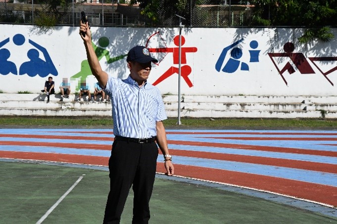 Acting principal presses the starting pistol
