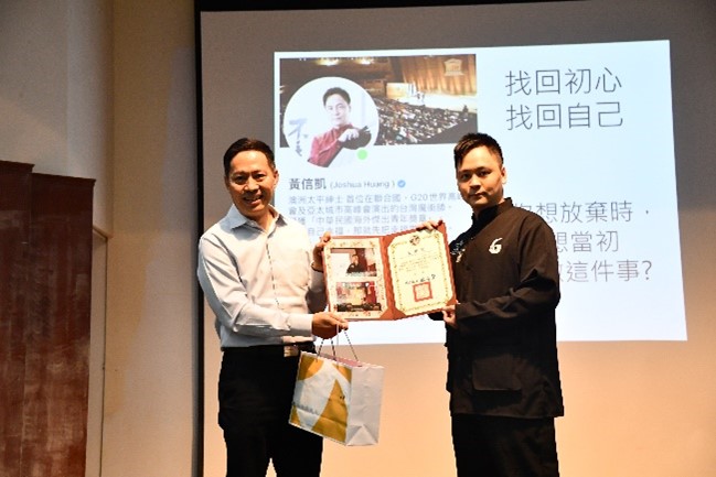 Acting principal presents a certificate of appreciation